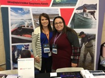 POLAR employees Melanie Bissonnette and Chanese Nakoyak from Human Resources tending to the POLAR booth to provide information and answer questions about job opportunities within the organization.